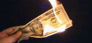 Lighting money on fire